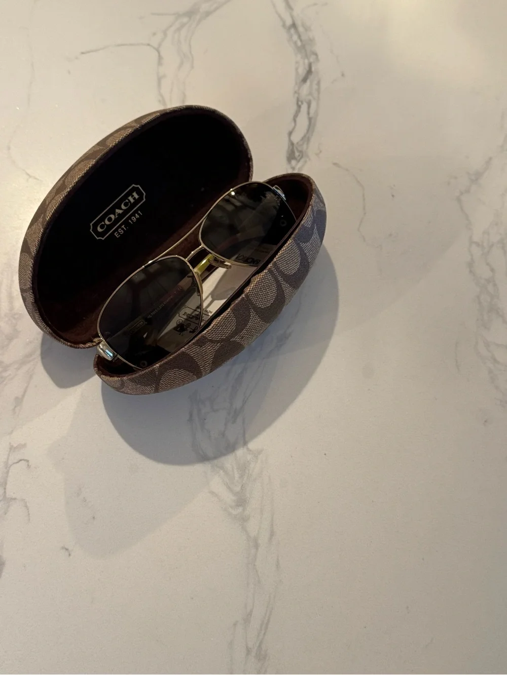 Coach Kristina HC7003 Aviator Gold Frame Sunglasses with Brown Gradient Lenses